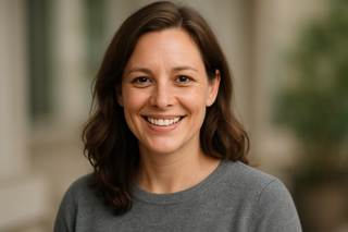 38 year old woman in casual headshot